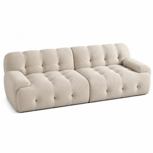 Sofá de 3 plazas tapizado en tejido bouclé beige con respaldo capitoné y brazos integrados 240 x 95 x 70 cm